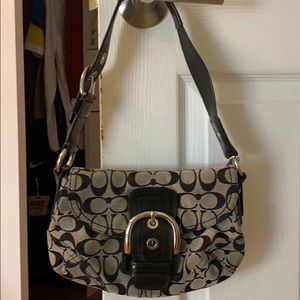 A mini Coach purse